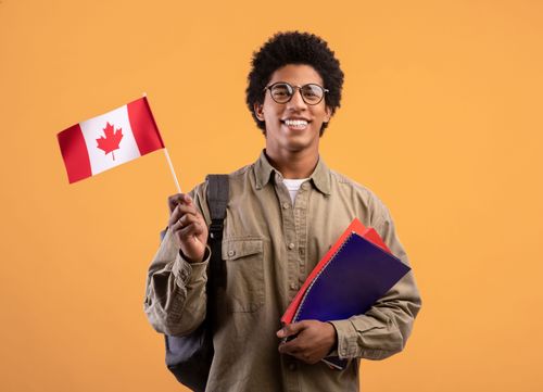 Man holding a Canadian flag